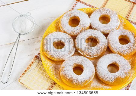 Homemade sweet donuts with caster sugar. Hanukkah homemade donuts. Sweet dessert. Sweet pastry doughnuts.