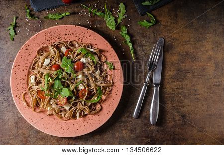 Spaghetti With Mozzarella, Cherry Tomatoes And Arugula