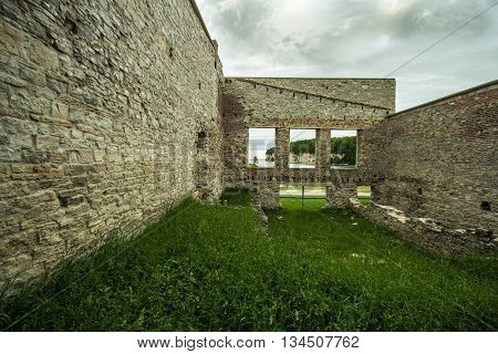 Ruins Of Fayette Ghost Town. Interior of an abandoned building with open windows facing the limestone cliffs on Lake Michigan. Fayette State Historical Park.