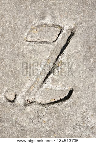 Cyrillic symbol Z on granite slab. Ukraine Zolochev Carpathian