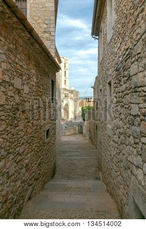 Ancient medieval narrow street in Girona. Spain. Catalonia.