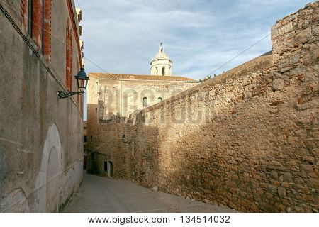 Ancient medieval narrow street in Girona. Spain. Catalonia.