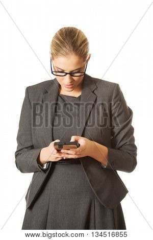 Businesswoman sending a message