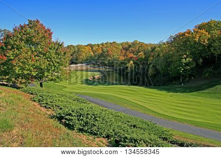 Golf Cours  Landrum With Large Green Lawn And Blue Sky