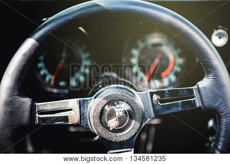 Benalmadena, Spain - June 21, 2015: Steering wheel detail of Chevrolet Corvette C3, in Benalmadena (Spain), on June 21, 2015.