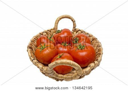 fresh tomatoes in a basket on a white backgroundtomatoes in the basket