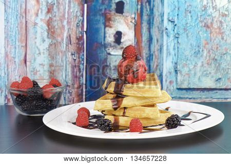 Belgium waffle, raspberry ice cream with fresh raspberry