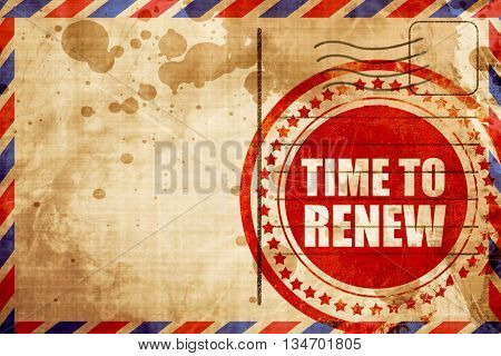 time to renew, red grunge stamp on an airmail background