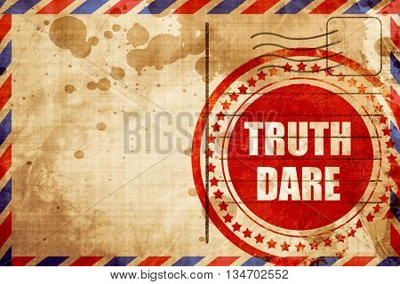 truth or dare, red grunge stamp on an airmail background