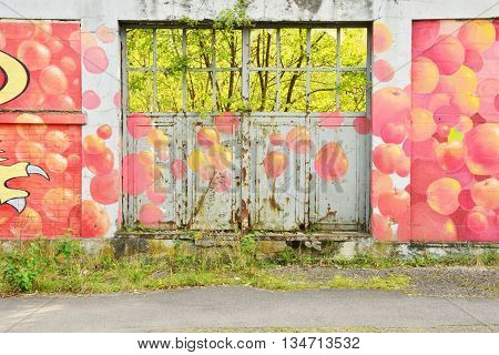 Saint Clair sur Epte France - october 10 2015 : paint on the wall of a ruin factory