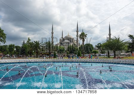 ISTANBUL TURKEY - JUNE 19 2015: Sultan Ahmet Mosque (Turkish: Sultan Ahmet Camii) is a historic mosque in Istanbul Turkey. The mosque is popularly known as the Blue Mosque for the blue tiles adorning the walls of its interior