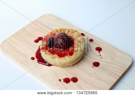 English Crumpets & Berry Topping On Wood Board Isolate On White Background