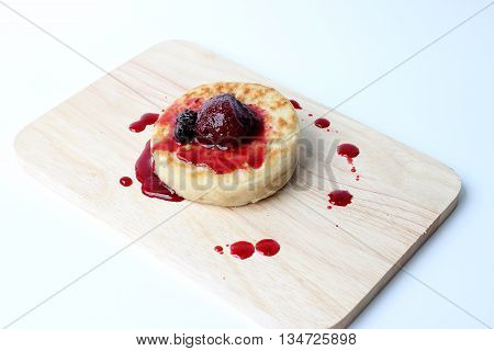 English Crumpets & Berry Topping On Wood Board Isolate On White Background