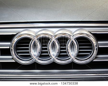 CRACOW POLAND - MAY 21 2016:Audi metallic logo closeup on Audi car displayed at 3rd edition of MOTO SHOW in Cracow Poland. Exhibitors present most interesting aspects of the automotive industry