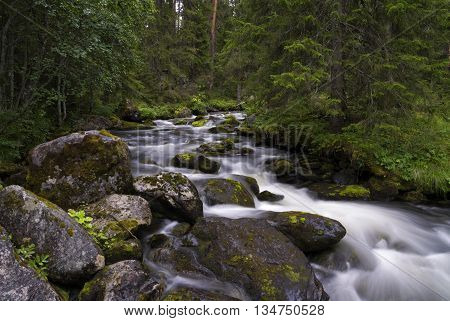 Tefafallet waterfall near the Swedish village Ljusnedal