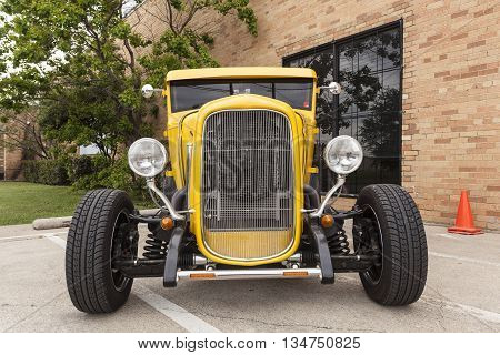 DALLAS USA - APR 9: Yellow hotroad based on the vintage 1932 Ford Coup model. April 9 2016 in Dallas Texas United States