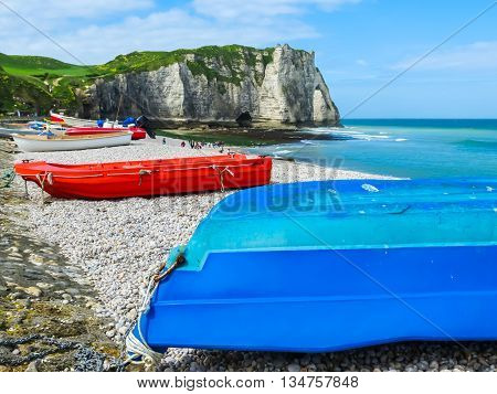 Fishing boats on the bank of English Channel. Etretat France