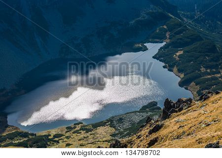 Beaitiful Mountain lake in the summer Valley of five lakes Poland Zakopane