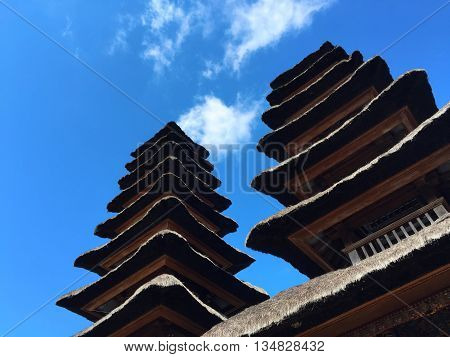 The roofs of religious buildings, pagoda roof of balinese temple, dry palm leaf roof of balinese temple