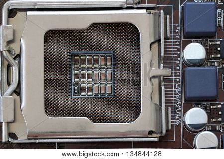 Socket electronics components on PC computer mainboard and have concept about technology.