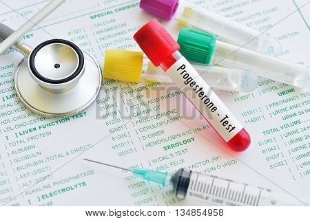 Test tube with blood sample for progesterone test