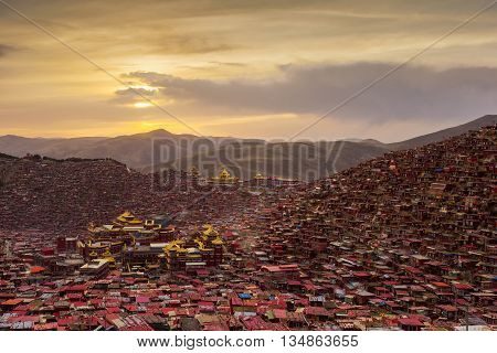 Monastery at Larung gar (Buddhist Academy) in sunset Sichuan China.