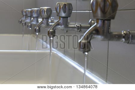 Long Rows Of Taps In The Bathroom Of Kindergarteners