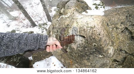 Knight Tries To Remove Excalibur Sword In The Stone