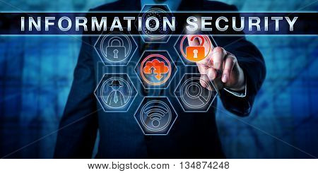 Corporate manager is pushing INFORMATION SECURITY on an interactive touch screen monitor. Information technology concept for data security computer security crime prevention and access control.