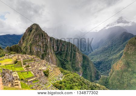 HDR of Machu Pichu in late afternoon with storm rolling in