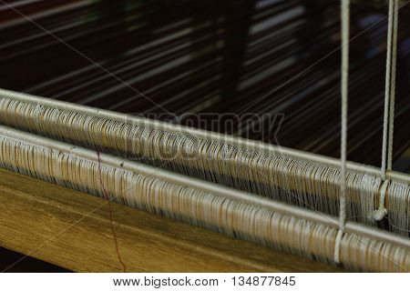 close-up Part of loom white thread homemade