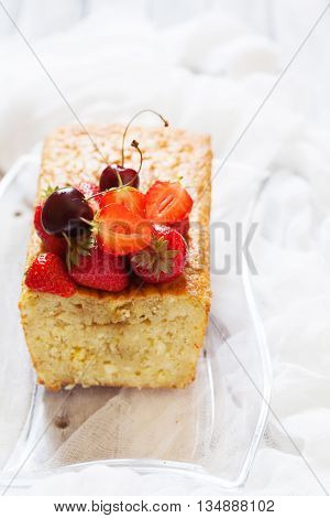 Fruitcake With Strawberry And Cherry Topping