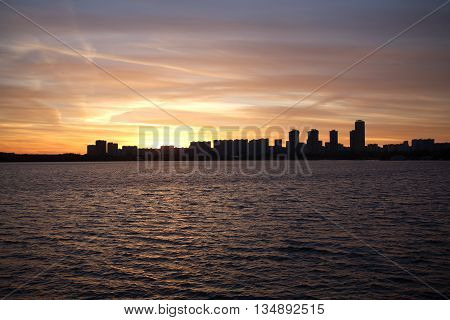 Moscow Strogino district in the evening at sunset. View from Strogino Bay