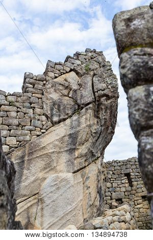 Inca construction at Machu Pichu using existing stone with walls built on top