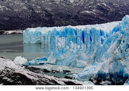 The blue ice of glacier Perito Moreno in Patagonia, Argentina