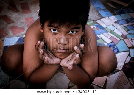 close up of eye of kid pauper