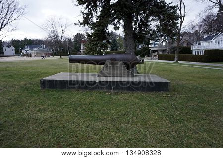 An old Civil War cannon serves as a monument in Zorn Park in Harbor Springs, Michigan.