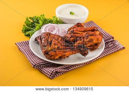 tandoori chicken leg, Tandoori Chicken , Indian spicy food, Delicious Tandoori chicken leg piece with Salad, India