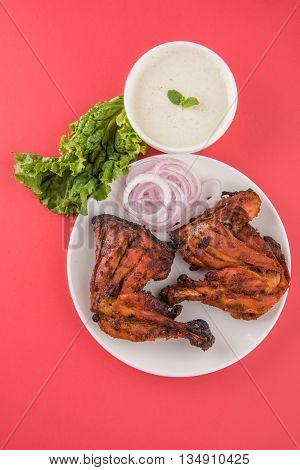 tandoori chicken leg, Tandoori Chicken , Indian spicy food, Delicious Tandoori chicken leg piece with Salad, India