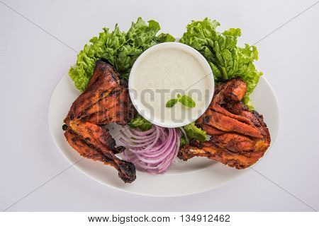 tandoori chicken leg, Tandoori Chicken , Indian spicy food, Delicious Tandoori chicken leg piece with Salad, India