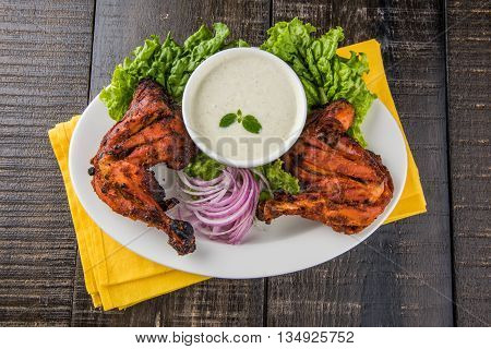 tandoori chicken leg, Tandoori Chicken , Indian spicy food, Delicious Tandoori chicken leg piece with Salad, India