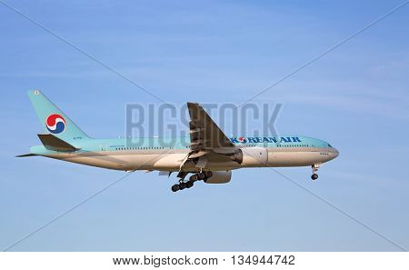 ZURICH - JULY 18: Boeing-777 Korean Air landing in Zurich after intercontinentall flight on July 18, 2015 in Zurich, Switzerland. Zurich airport is home for Swiss Air and one of biggest european hubs.