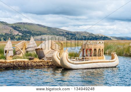 Traditional village on floating islands on lake Titicaca in Peru South America