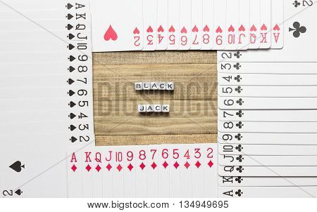 blackjack text inside border made of play card