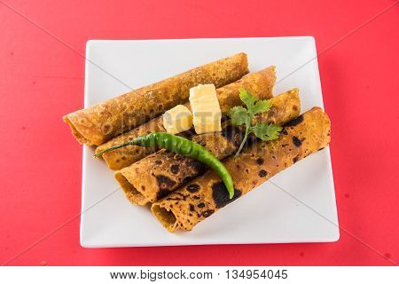 Hot delicious paratha with ghee, green chilly, coriander and tomato sauce. Paratha Rolls. Chapati made using indian spices. Kolkata rolls