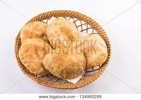 indian puri or poori or fried roti or bhatura, isolated