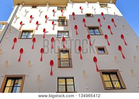 FLORENCE, Italy - January 18, 2016: wall of the Gallery Hotel Art with installation Spoon - I eat earth by designer Simone D'Auria on January 18, 2016 Florence, Tuscany, Italy