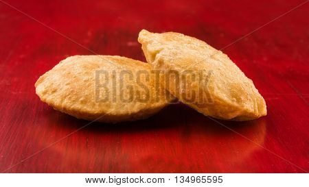 indian puri or poori or fried roti or bhatura, isolated