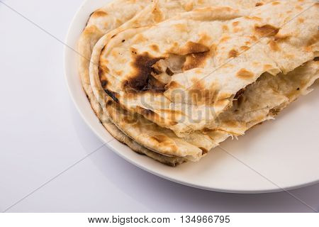 Homemade Indian Naan Flatbread made with Whole Wheat, plain indian roti, plain tandoori roti