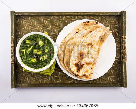 tasty palak paneer served with nan / naan / roti / chapati / fulka / tandoori naan / indian bread